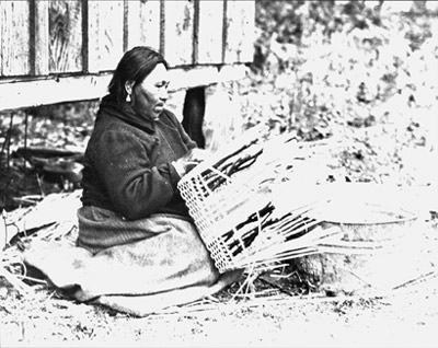 oast Salish Woman Weaving a Basket, Old Songhees Reserve