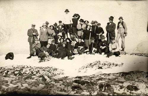 Group of citizens pose on snow